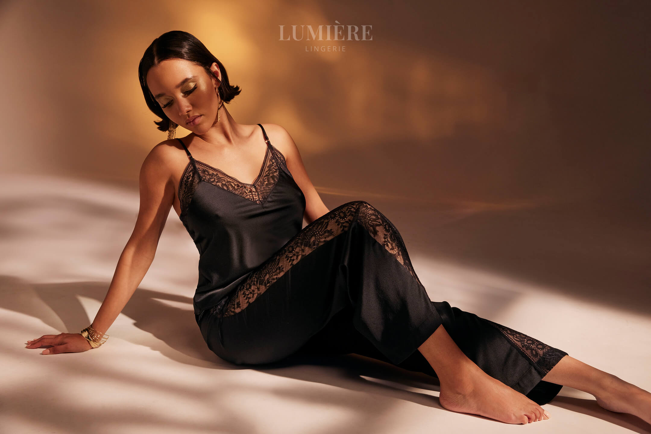 Olivia von Halle pure mulberry silk fabric showing natural sheen and drape quality at Lumiere luxury boutique Limassol Cyprus